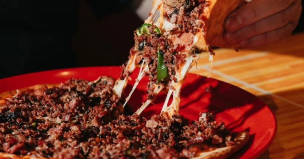 Creating the Perfect Smoked Meat Pizza at Home